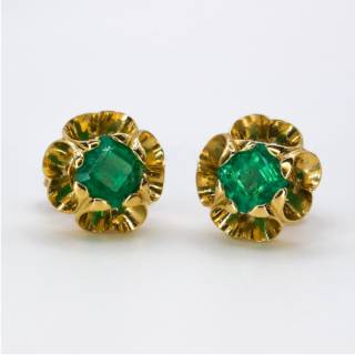 Fresh Springtime 18ct Emerald Flowerhead Stud Earrings.The emeralds are natural and set in buttery 18ct yellow gold.They are secured on the ear by a post and butterfly.Easy and comfortable to wear.Contact us if you would like further information about these earrings.