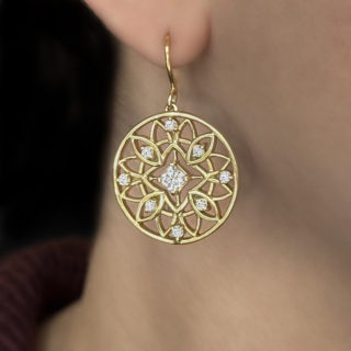Exquisite Heart on Fire 'HOF' Drop Earrings. Beautifully made circular drop 18ct yellow gold discs 2.5cm diameter with a drop of 3.5cm from the ear fixing. There is a delightful patterned pierced design in gold with 8 sparkly brilliant cut diamonds surrounding the central diamond. The makers mark 'HOF' is on the back of the each circular drop earring and on the shepherds crook fixing together with the gold mark 750, donating 18ct gold. Please contact us if you would like to know more about these stunning earrings or visit at Saddingtons Jewellery, Mayfair.