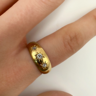 Glowing Antique Three Diamond Gypsy Ring.Beautiful sparkling star set old cut diamonds 0.40ct diamond weight set in 18ct yellow gold.The ring has a makers mark 'AA TW' with a London 1897 hallmark.An easy to wear and low on the finger ring.UK size O1/2,can be resized preserving the hallmark.Please contact us if you would like further information about this ring or assistance or advice about the process of buying this ring.