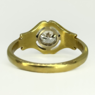 Unique Bezel Set Edwardian 1.2ct Diamond Single Stone Ring.The 1.2ct transitional cut diamond is set in 18ct yellow gold,the shoulders are sweeping around the bezel set diamond.The diamond is G-H colour and the clarity is VS2.A beautiful single stone ring.The ring can be resized.Please contact us if you would like to know more about this ring.