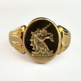 Unusual Oval Antique Gold Unicorn Signet Ring.Sturdy Carved shank with an oval head which has a unicorn carved intaglio.Hallmark Birmingham 1918.18ct yellow gold,polished finish.This chunky signet ring is UK size V1/2,it can be resized preserving the antique hallmark.Please contact us if you would like to know more about this