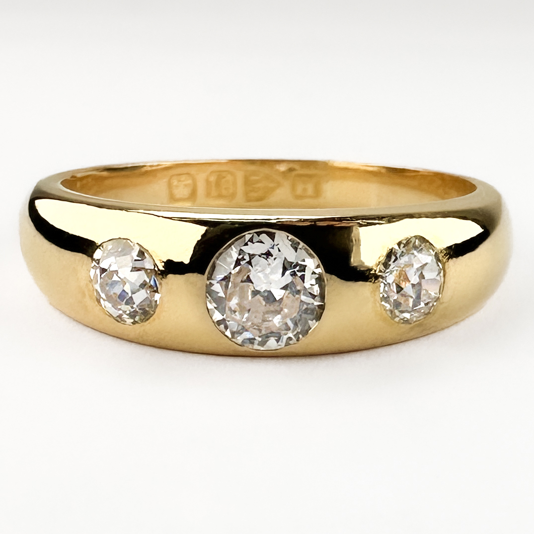 Beautiful Antique 3 Stone Diamond Gypsy Ring. Hallmarked to Chester 1891, this amazing gypsy has 3 bright victorian old cut diamonds set in an 18ct yellow gold shank. The diamonds total to 0.75ct, are G-H in colour and VS1 clarity. This ring can be resized. Please contact us if you would like to know more about this lovely ring or visit us at Saddingtons Jewellery, Mayfair.