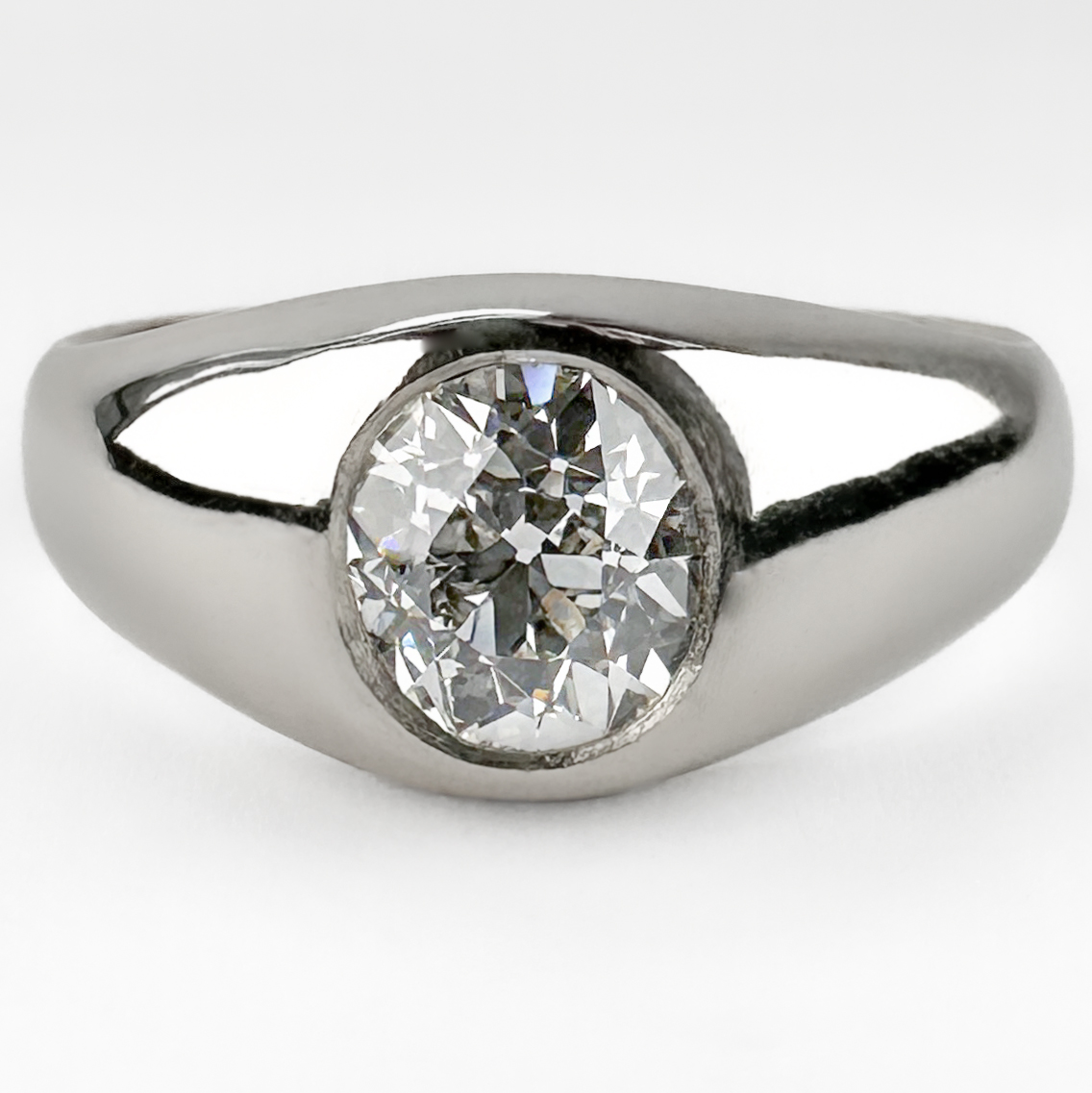 Incredible Platinum Single Stone Gypsy Ring 1.36ct. This amazing antique Edwardian platinum gypsy ring features a stunning 1.36ct weighed old cut Victorian/Edwardian diamond. The very bright stunning diamond is G-H in colour and VS1 in clarity. The ring weighs 13.1 grams and can be resized. Please contact us if you would like to know more about this wonderful gypsy ring or visit us at Saddingtons Jewellery, Mayfair.