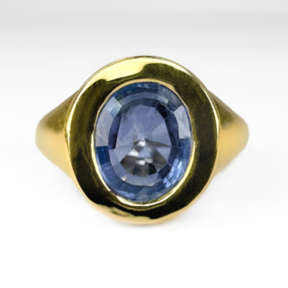 Sapphire Signet Ring. This gorgeous Edwardian signet ring features an oval natural unheated 3ct blue sapphire. The stone is set in an 18ct yellow gold shank. The shank features a hallmark dating the ring to 1907. Please contact us if you would like to know more about this stunning ring or visit us at Saddingtons Jewellery, Mayfair.