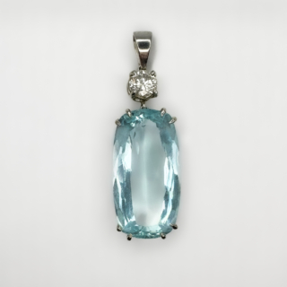 Large Drop Cushion Aquamarine And Diamond Pendant.The gems claw set, mounted in platinum.The top of the pendant has a tapering substantial bale wide enough to pass a chain catch through.The diamond is 0.45ct weight of bright diamond,the rectangular cushion aquamarine measures 2 x 1.2cm.The total drop from the top of the bale measures 3.5cm.The pendant is worn with a neckchain which is not included in the sale,please contact us if you would like to purchase a chain with the length you would desire.