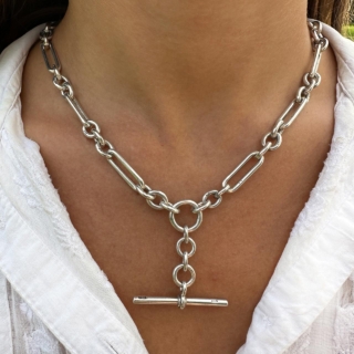 Striking and Rare Chunky Trombone Link Albert Neckchain in Hallmarked Birmingham 1927. The trombone links 0.7 inches/2 cm. The full chain measures 17 inches x 43cm with a dog clip catch. The front central large silver link drops to the T-Bar 1.5 inches /3cm. A stunning Albert Chain.