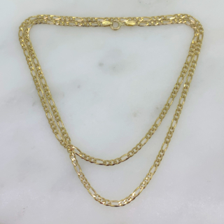 Beautifully classic 3mm Figaro 24" Chain in 9ct Yellow Gold, Hallmarked Italy, import mark Birmingham, 1985. The chain has a width of 3 mm, a length of 24" and is joined by a spring ring clasp. Lying elegantly flush to the skin, typical of a Figaro chain.