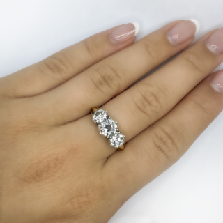 Stunning Antique 3 Stone Trilogy Diamond Ring 2.65ct in Total.This Victorian trilogy diamond ring has a central 1ct diamond weight, with the 2 outer diamonds weighing 1.65cts,the total weight of diamonds being 2.65cts.The diamond clarity of all 3 diamonds VS2,Colour G-H.The diamonds are. Victorian Transitions Brilliant Cut.The shank is 18ct yellow gold carved reeded,the diamonds are set in silver which is typical of Victorian rings.