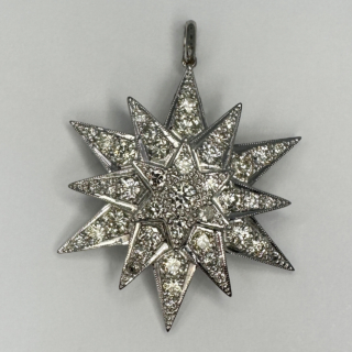 Dazzling, Mesmerising Diamond Star Pendant, in 15ct white gold, tested. A striking vintage natural diamond pendant with a total diamond weight of 2.35 cts. The diamonds are pave set and bright brilliant cut. The style is classic and timeless. The length including the bale is 1.5 inches and 1.2 inches to the widest star points wide. There are 3 stars in descending order giving a 3 dimensional effect. Contact us for further information, we can send a video on request. White gold chain is not included but we have a selection of white gold chains, please ask for details.