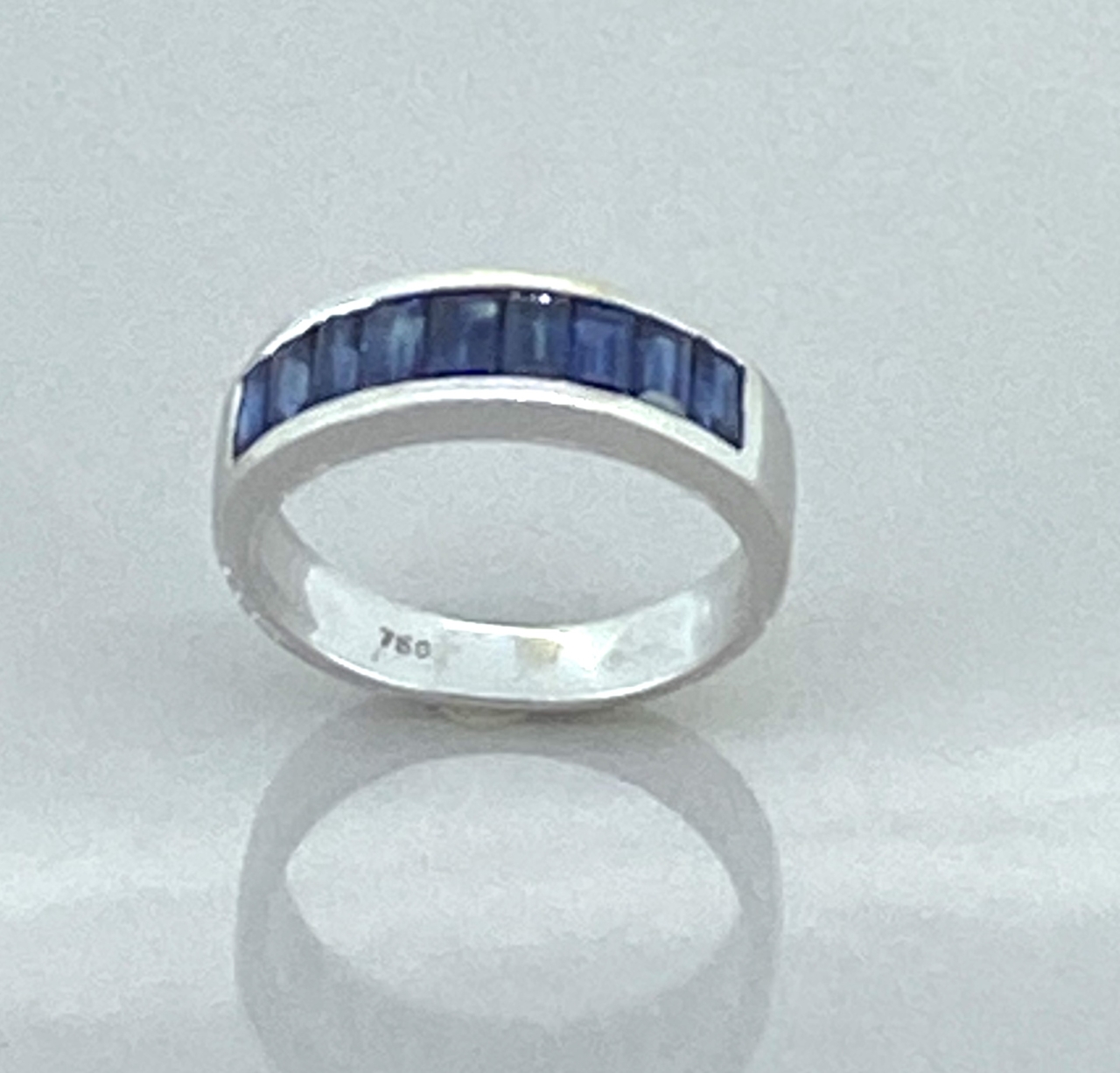 18 Carat White Gold and Baguette Sapphire Half Eternity Ring UK Size K