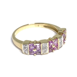 Pink Sapphire Half Eternity Ring with 9ct Gold shaft. Set is 12 pink Amethysts in sets of four and 8 Diamonds all in a rub over setting.