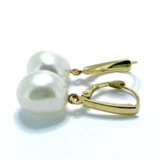 Vintage Pearl Drop Earrings mounted on 14ct stamped gold pierced ear fittings. The pearls measure 9.5 mm X 11.5 mm and are baroque in shape.