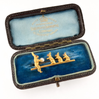 Edwardian rabbit brooch with ruby eyes & natural pearl 18ct gold in box