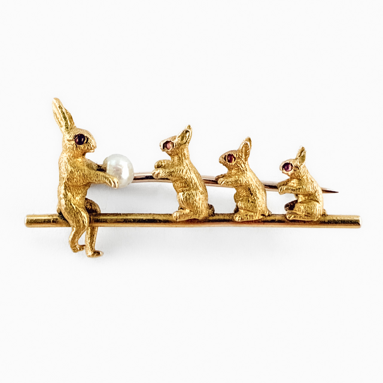 Edwardian rabbit brooch with ruby eyes & natural pearl 18ct gold front