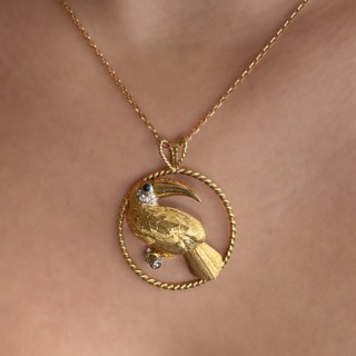 E. Wolfe & Co. Diamond and Sapphire Toucan Pendant 18ct gold on neck