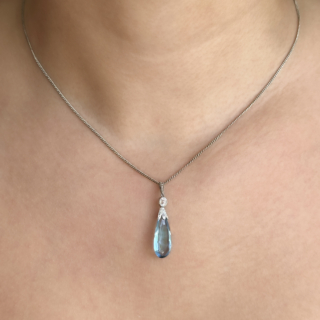 Aquamarine & Diamond Drop Pendant With Chain plat and white gold on neck