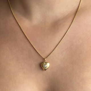 Diamond Set Gold Heart Pendant 15ct gold on neck