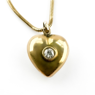 Diamond Set Gold Heart Pendant close up to pendant