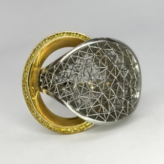 Designer Tom Rucker Sun Stroke Ring. An exceptional example of contemporary fine jewellery,crafted for collectors who appreciate architectural design and meticulous craftsmanship. Handmade in platinum using Tom Ruckers award winning GEO laser mesh technique,the ring has an intricate teardrop form built from hundreds of precision welds. This signature platinum mesh creates a lightweight dimensional surface to reflect light. Encircling the mesh is an 18ct yellow gold halo,pave set with natural fancy yellow diamonds. The warm gold is vibrant diamond colour contrast beautifully with the cool platinum resulting in a sculptural modern composition that feels luxurious and timeless. The Tom Rucker ring is available at Saddingtons Mayfair,contact us to book a private client appointment.