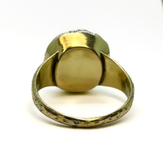 Rare Antique Georgian Golden Topaz & Old Cut Diamond Cluster Ring.Glowing golden 6ct weight topaz central stone surrounded by a halo of old cut diamonds.The cluster has a closed back in keeping with the style of the Georgian era.The stones are claw set,the shank has beautiful intricate scrolling detail additionally in keeping with the styles of jewellery in the Georgian era.An extremely beautiful period ring.Please contact us if you would like further information on this ring.