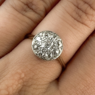 Edwardian Diamond Daisy Cluster Ring on the hand