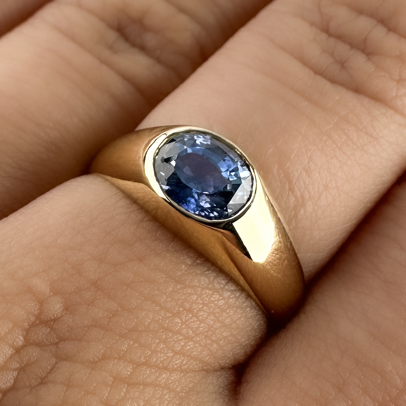 Ceylon Sapphire Solitaire Gypsy Ring 18ct gold on hand