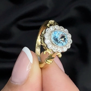 aquamarine and diamond cluster oval ring